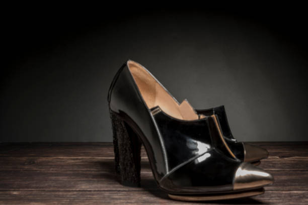 istock woman patient leather shoes 911483436
