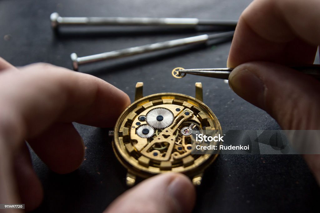 Process of installing a part on a mechanical watch, watch repair Watch - Timepiece Stock Photo