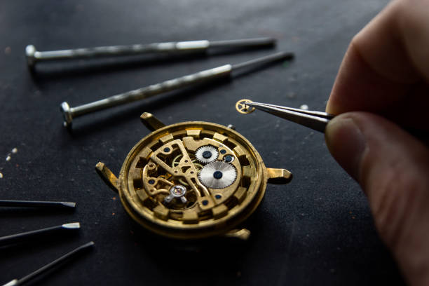 istock Watchmaker is repairing the mechanical watches in his workshop 911497732
