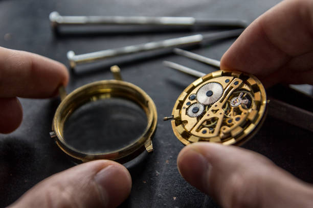 istock Watchmaker is repairing the mechanical watches in his workshop 911497780