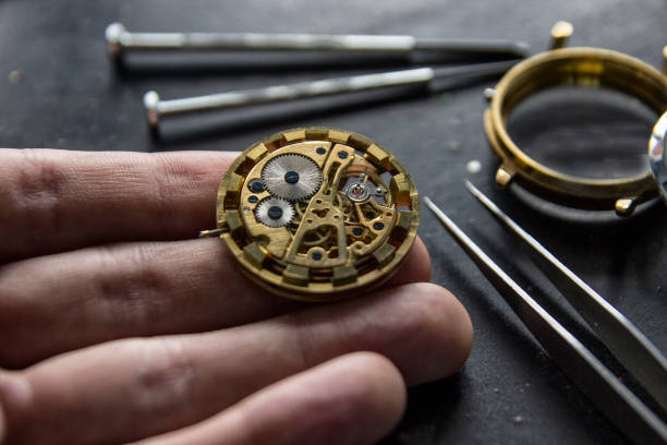 istock Watchmaker is repairing the mechanical watches in his workshop 911497814