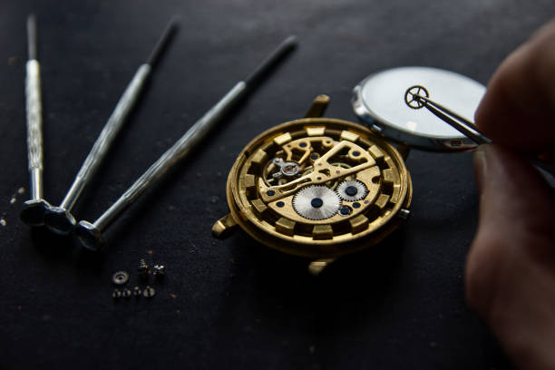 istock Watchmaker is repairing the mechanical watches in his workshop 911498488