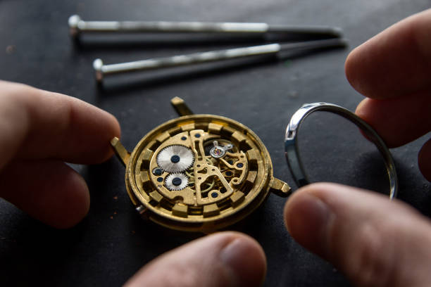istock Process of installing a part on a mechanical watch, watch repair 911500052