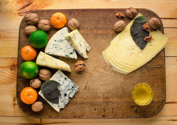 istock various types of cheese and fruits, top view 911506196