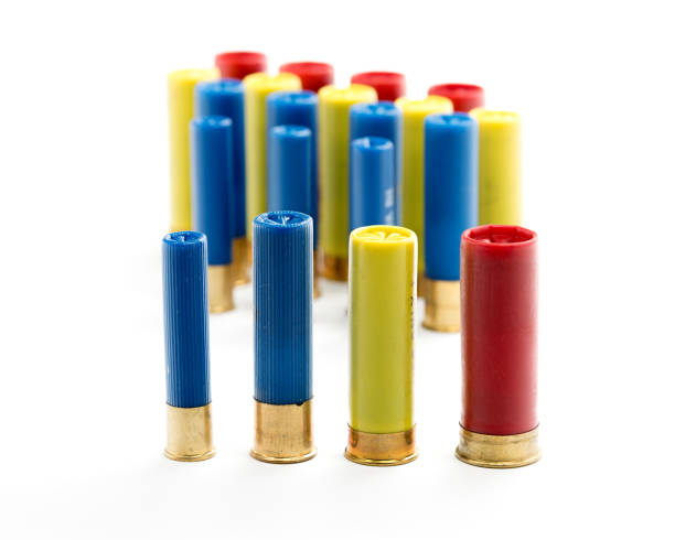 istock Four different shotgun shell sizes that are all different colors 911507898