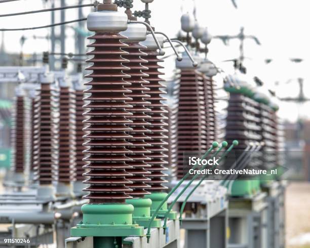 Vintage Ceramic Isolators On Power Substation Stock Photo - Download Image Now - Ceramics, Industry, Electricity Transformer