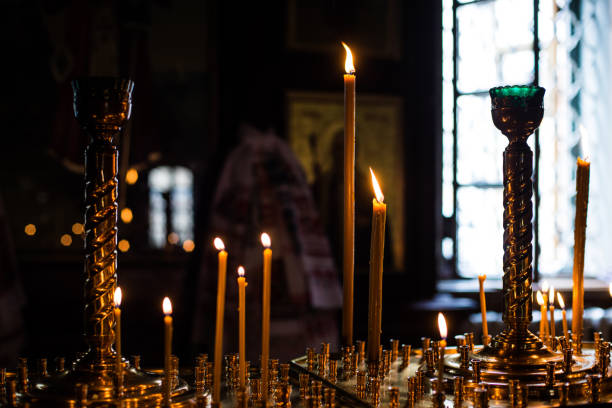 istock Many burning candles with shallow depth of field 911513740