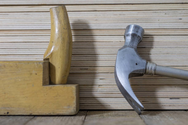 istock Carpentry tools on a wooden table in an old carpentry workshop. Old carpentry learning. Black background. 911516928