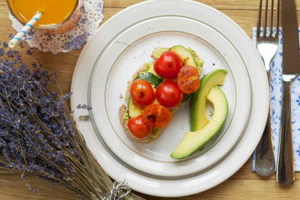 Tomatoes, courgette and avocado on toast