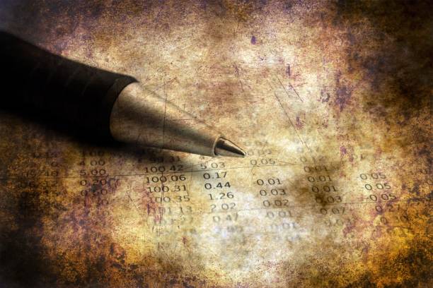 istock Pen on financial report grunge concept 911519562