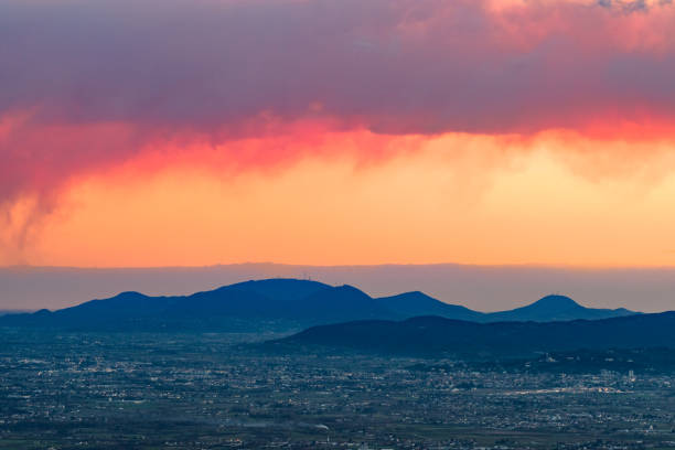 Sunset over Arsiero and Piovene Rocchette with the Euganean Hills in the background