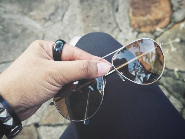 istock Selfie of Sun glasses on hand 911526162