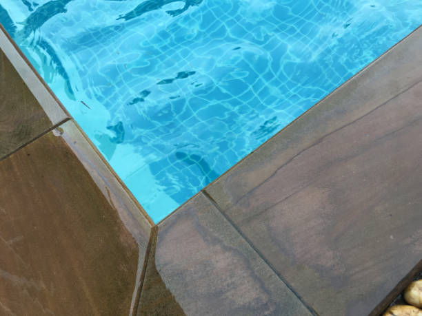 istock Concrete corner of swimming pool 911532052