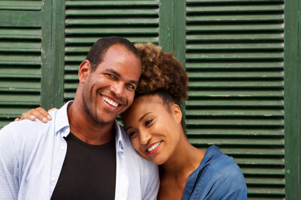 istock Close up romantic attractive couple in embrace laughing 911536230