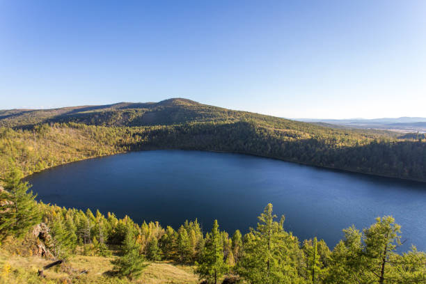 istock Crater Lake scenery surrounded by forests 911541058