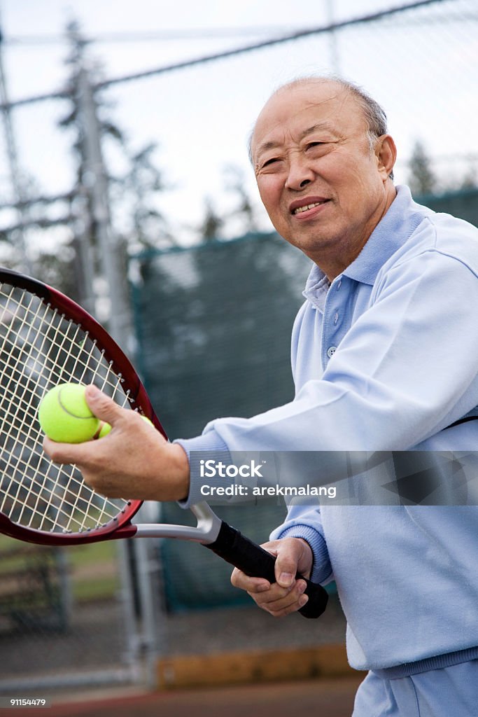 Sênior Jogador de tênis - Foto de stock de 70 anos royalty-free