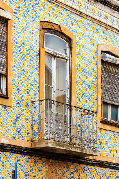 istock Mediterranean house facade with tiles and a small balcony 911546652