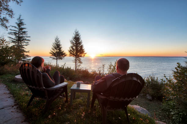 Couple watching a beautiful sunrise together