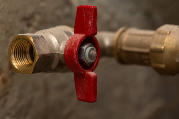 istock Closed red ball valve brass on pipe 911549078