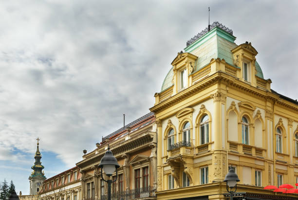 istock beautiful building and a Church tower 911564504