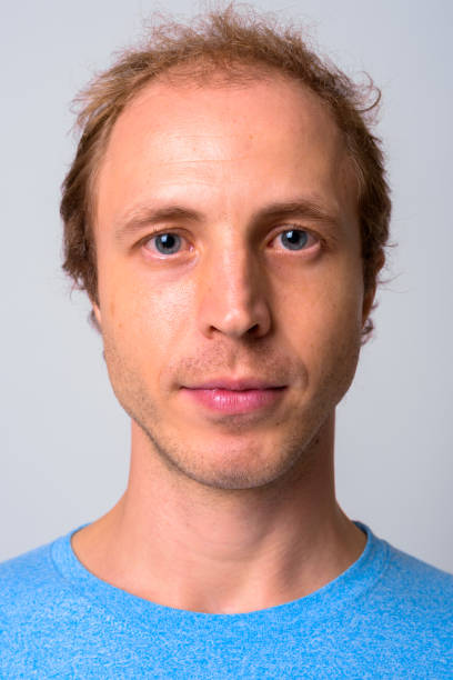 istock Face Of Man Against White Background 911573370
