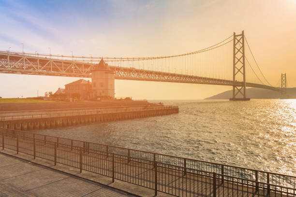 istock Akashi Kaikyo suspension bridge sunset tone 911573698