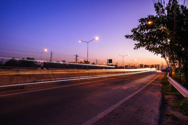 istock traffic highway road evening after sunset 911586618