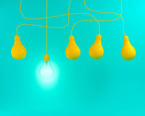 istock Hanging yellow light bulbs with glowing one different idea on green pastel background ,  flat lay , Minimal concept idea 911587164