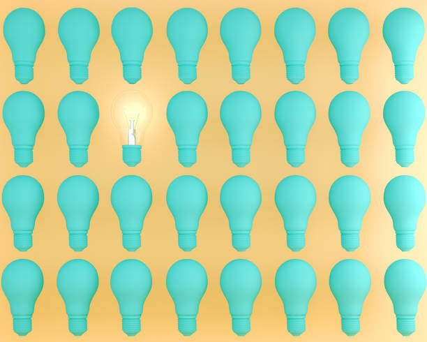 istock Idea concept : Creative green light bulb with glowing Idea concept on yellow pastel background, flat lay , minimal concept 911589314