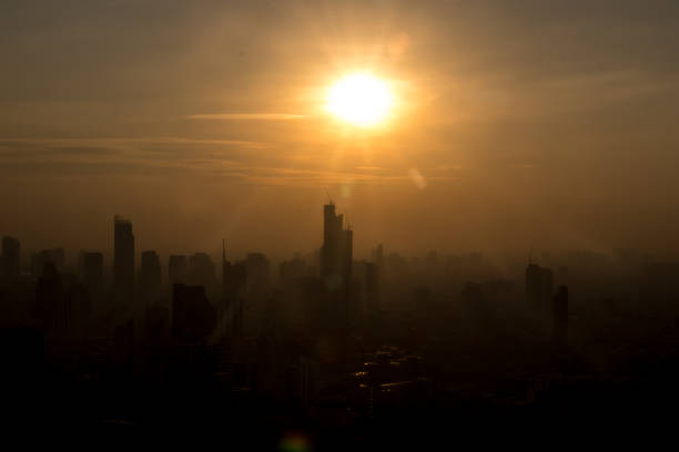 istock Sun shining above the building 911593356