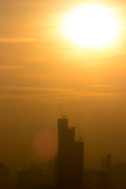 istock Sun shining above the building 911593468