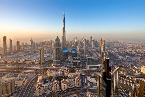 istock City lights in Dubai at sunrise 911607952