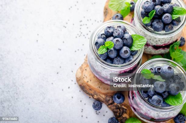 Chia Pudding With Blueberry Mint Leaves And Jam Stock Photo - Download Image Now - Blueberry, Chia seed, Mousse - Dessert