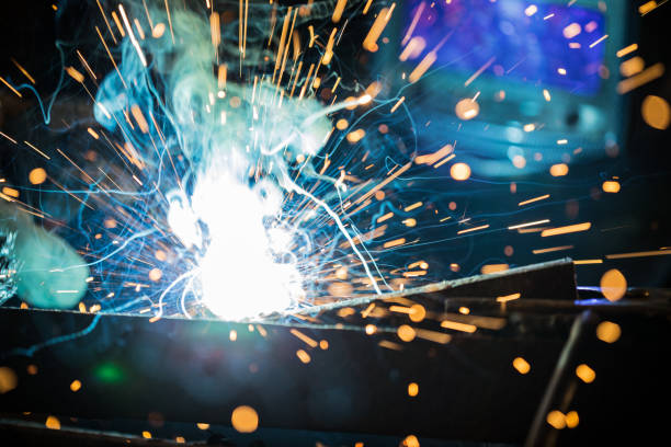istock Welder working at the factory made metal 911615586
