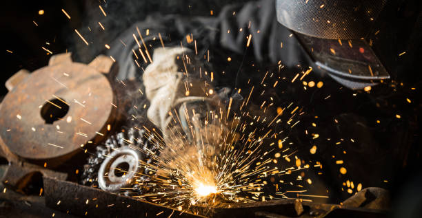 istock Welder working at the factory made metal 911615594