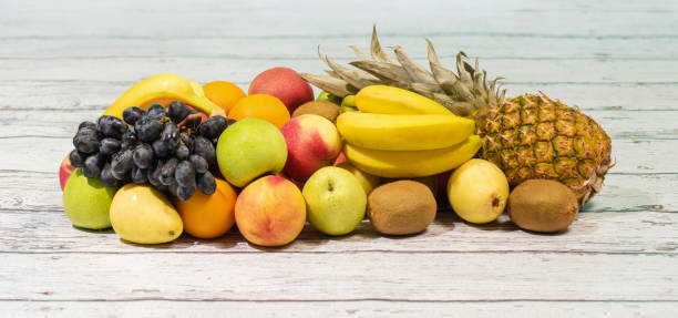 istock Assortment of exotic fruits on white background 911618192