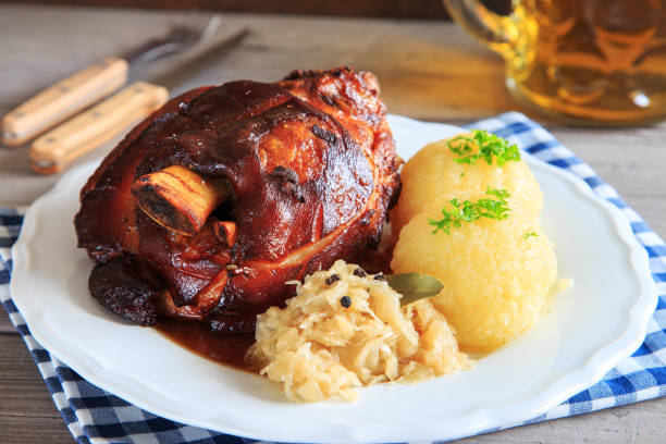 Grilled knuckle with sauerkraut and dumplings