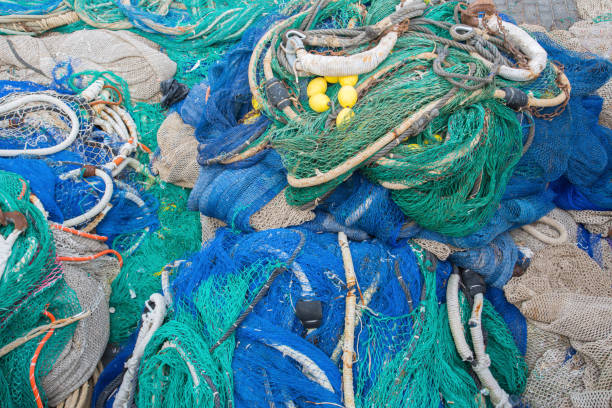 istock A big pile of nets, ropes and fishing accessories 911625708
