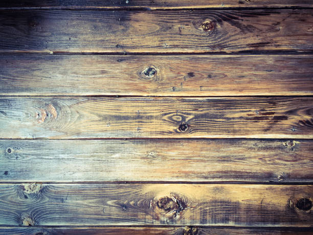 istock Wood texture background, brown wood planks. Grunge washed wood wall pattern. 911625946
