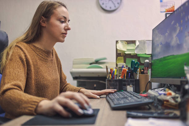 istock Beautiful young woman working in printing centar 911629202