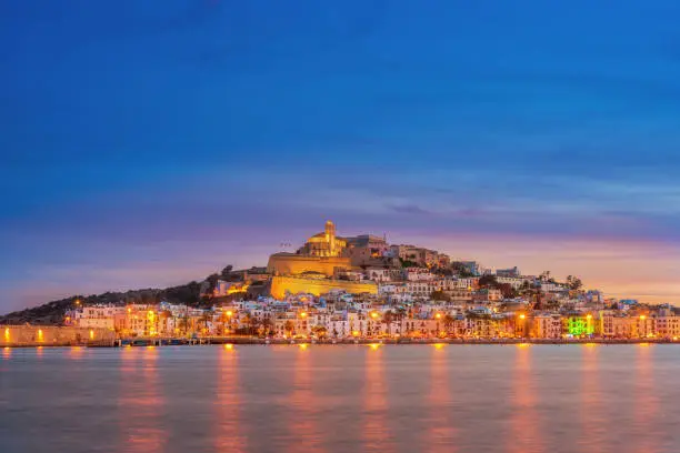 Beautiful view on Ibiza Town (Eivissa) at sunset. The historic fortified center, Dalt Vila (the upper town) and the cathedral of Ibiza in warm light.