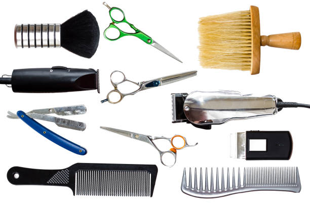 istock Combs, clipper and other hairdresser tools isolated on white background. 911633094