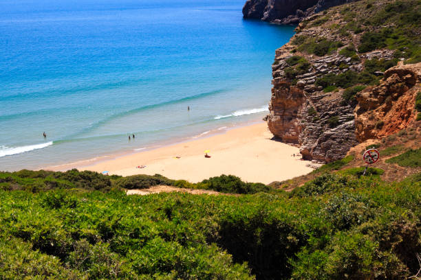 istock Hidden beach bay on the portuguese cliff 911637516