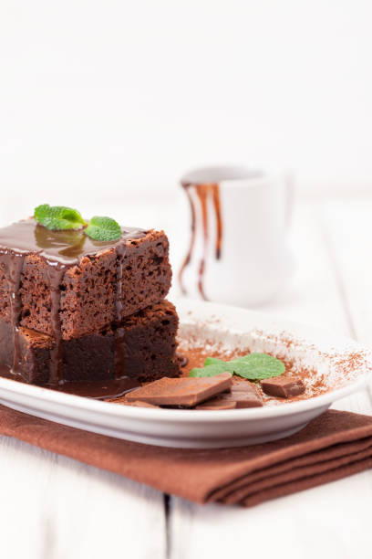 A close-up look as a fork cuts into part of a fine dining restaurant's dessert.