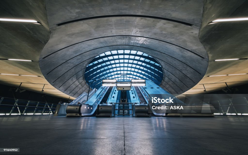 The Canary Wharf tube station , London Subway Station Escalators, Canary Wharf, London, England Architecture Stock Photo
