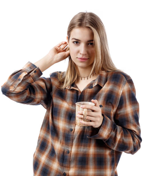 istock Pretty woman with mug on white background. 911642734