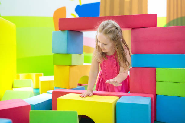 istock Kids play. Construction toy blocks. Child toys 911649370