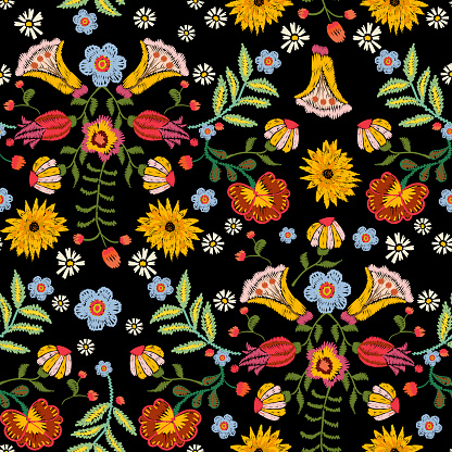 Embroidery ethnic seamless pattern with colorful flowers. Vector traditional floral bouquet. Tribal style design for fashion wearing.