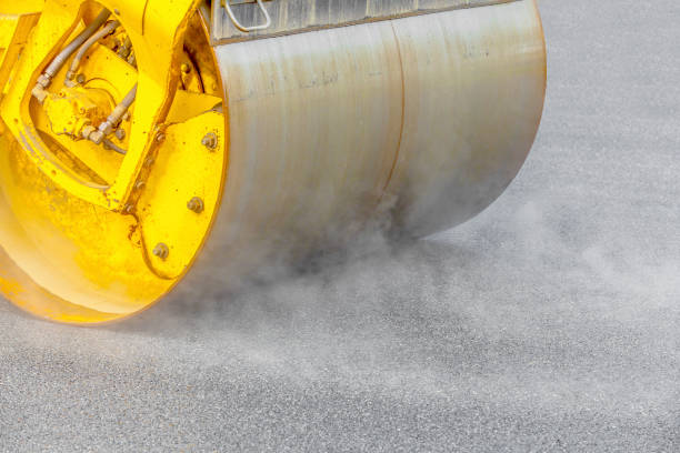 istock Road roller flattening new asphalt 911653500