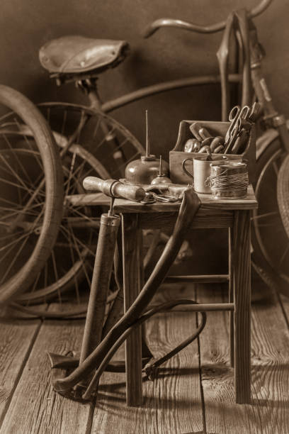 Bicycle repair workshop with tools, wheels and tube